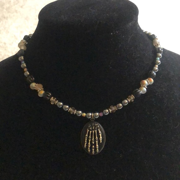 Hand crafted skeleton hand hematite Czech glass necklace - Picture 3 of 6